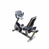 Precor RBK 815 recumbent stationary bike with step-through frame