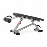 Star Trac Instinct INB7200 commercial decline bench with heavy oval steel frame and leg rollers