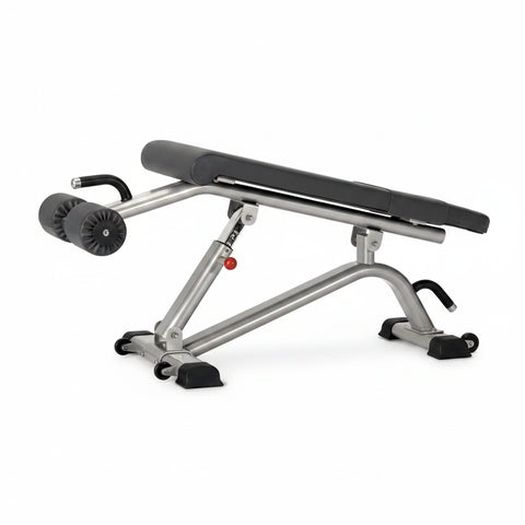 Star Trac Instinct INB7200 commercial decline bench with heavy oval steel frame and leg rollers