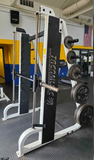 Side angle profile view of a vintage commercial-grade Streamline Smith machine frame