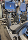 Profile view of the Cybex 770R commercial recumbent exercise bike featuring a step-through frame design and ventilated backrest