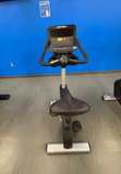  Close-up of the Life Fitness Integrity C Console featuring a dual-level LED message center, tactile membrane buttons, and integrated reading rack.