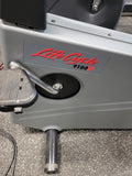 Full studio shot of a Life Fitness Lifecycle 9100R recumbent exercise bike featuring a low-profile step-through frame design, contoured bucket seat, and side-mounted handlebars