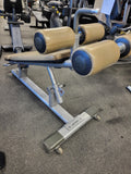 Close-up of Life Fitness SADB commercial ab bench high-density upholstery and heavy-duty Signature Series frame, used condition with minor cosmetic wear