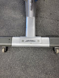 Side view of pre-owned Life Fitness Signature Series SADB adjustable decline abdominal bench showing multiple decline positions and leg rollers in Lancaster PA