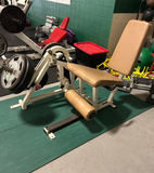 Magnum Fitness plate loaded leg extension with adjustable ankle pad