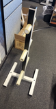 6 peg plate tree holding Olympic 45 lb and 25 lb plates