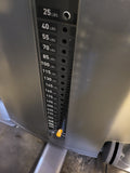 Close-up of the Precor Vitality C010ES 295 lb selectorized weight stack