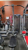 High-resolution view of the instructional placard on the Vitality Series C026ES showing proper form for both lat pulldown and seated row movements.
