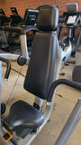 Close-up detail of the commercial selectorized weight stack on a Precor DSL0404 chest press.