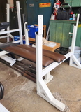 Heavy-gauge 2x3 and 3x3 steel tubing frame on ProMaxima FW-115 Olympic bench