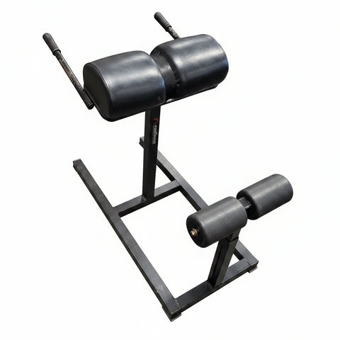 ProMaxima Glute Ham Developer GHD commercial grade made in USA with heavy steel frame and split thigh pads.