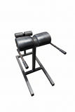 ProMaxima GHD showing adjustable foot rollers and side handles for glute ham raises and back extensions, 500+ lb capacity, good used condition