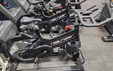Real Ryder ABF8 commercial group cycling bike with dual SPD pedals and adjustable bars