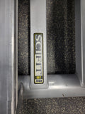  Lateral studio view of the SCIFIT SXT7000 physical therapy model equipped with long, silver medical-grade protective side safety rails extending along the base.