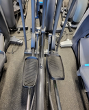 Close-up of the SportsArt E840 tri-color LED workout console highlighting the built-in cardio advisor tracking matrix and reading rack