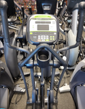 Side view of the heavy-duty SportsArt E840 elliptical showing the electronically adjustable stride mechanism and MyFlex cushioned pedals