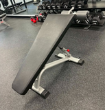 Star Trac INB7200 Instinct series fixed decline bench showing commercial upholstery