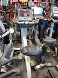 Commercial Star Trac Pro upright stationary bike model 9-6330 on a gym floor.