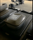 Technogym Excite 700e apart for transport showing console, frame, and motor separated for loading